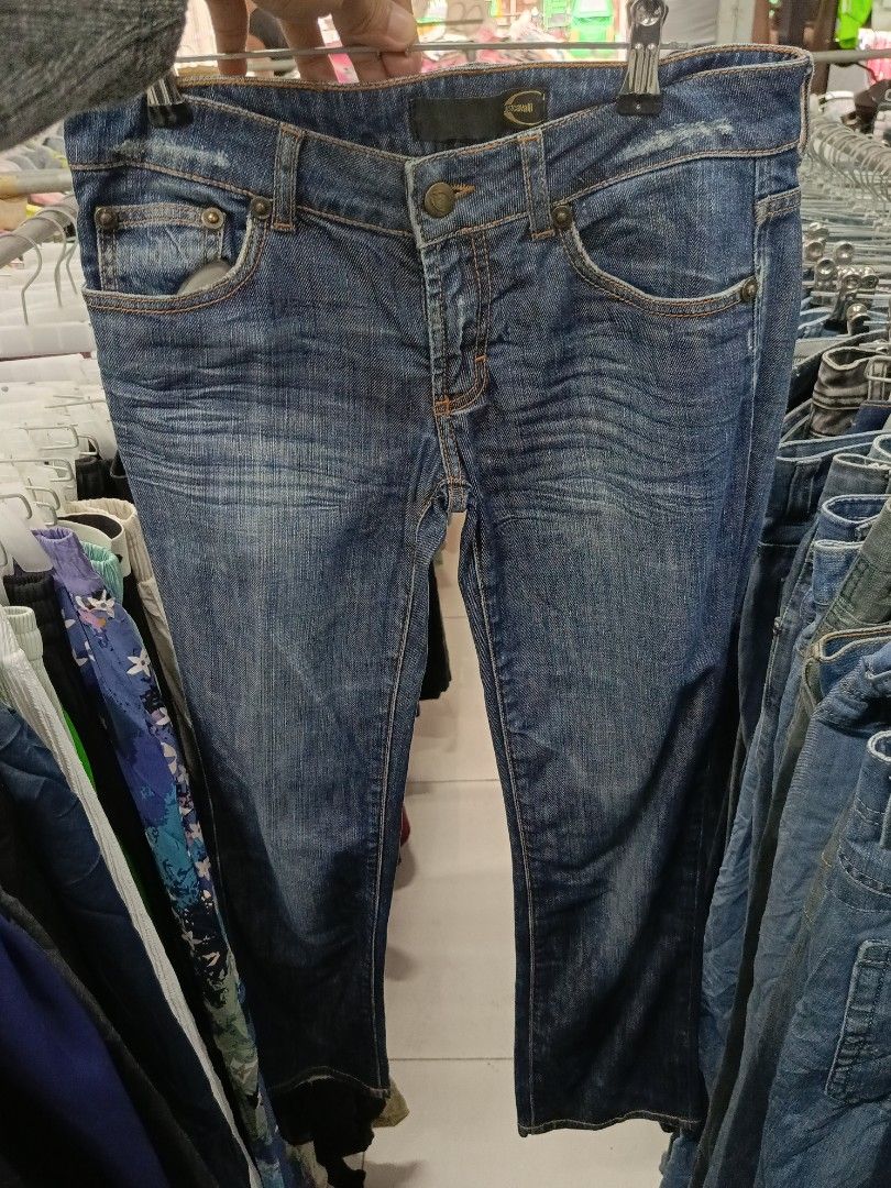 Just Cavalli Firenze Denim Jeans Blue (Category: Jeans) located in Cabatuan. Submitted by penthegreat (Listing ID 1470827083, Image 1). Description: - Brand: Just Cavalli Firenze - Color/Wash: Dark blue wash - Fit: Classic straight leg - Design: Classic five-pocket style with contrast stitching - Details: Branded leather patch on back waistband and engraved metal hardware - Closure: YKK zip fly with branded button - Condition: Great designer piec