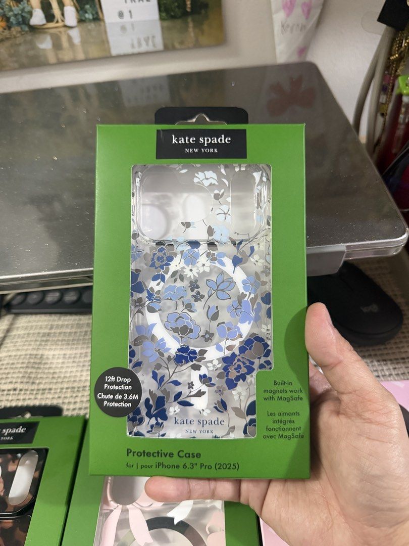 Kate Spade 17 pro (Category: Cases & Sleeves) located in Bacoor. Submitted by alrtf (Listing ID 1470805528, Image 2). Description: - Brand: Kate Spade New York - Compatibility: iPhone 17 Pro (6.3" 2025) - Design: Elegant blue and white floral pattern on a clear case - Features: Built-in magnets for MagSafe compatibility - Protection: 12ft drop protection for reliable daily defense - Condition: Brand new in original box.