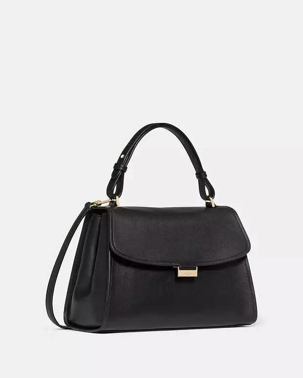 Kate Spade Black Leather Shoulder Bag (Category: Luxury Bags & Wallets) located in Paranaque City. Submitted by MLandCobyApple (Listing ID 1470888363, Image 2). Description: - Brand: Kate Spade - Color: Classic Black with chic gold hardware - Material: Premium leather - Design: Clean, minimalist front-flap closure - Versatility: Includes a structured top handle and an adjustable long strap - Condition: Brand new, unwrapped only for photos, still 