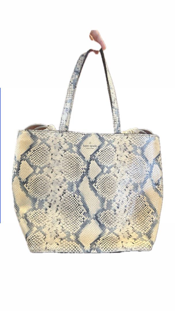 Kate Spade Snakeskin Print Tote Bag (Category: Tote Bags) located in Cebu City. Submitted by hanamatsuura (Listing ID 1470910162, Image 1). Description: Barely used Good as new No flaws Rfs: i don’t use it at all.