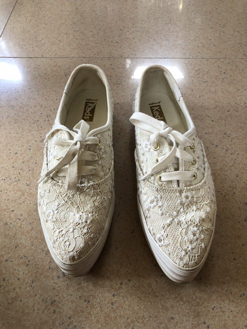 Keds Lace Platform Sneakers Cream Off-White (Category: Sneakers) located in Davao. Submitted by stylecircuit (Listing ID 1470768267, Image 1). Description: - Brand: Keds - Color: Cream with gold tone eyelets and logo prints - Design: Intricate all-over lace and sequin embroidery - Sole: Platform rubber sole with added height - Comfort: Cushioned Softerra footbeds for all-day wear - Condition: Worn a few times only.