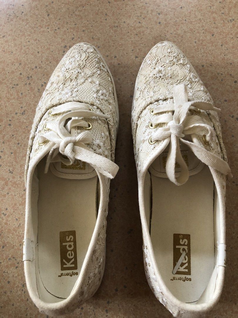 Keds Lace Platform Sneakers Cream Off-White (Category: Sneakers) located in Davao. Submitted by stylecircuit (Listing ID 1470768267, Image 2). Description: - Brand: Keds - Color: Cream with gold tone eyelets and logo prints - Design: Intricate all-over lace and sequin embroidery - Sole: Platform rubber sole with added height - Comfort: Cushioned Softerra footbeds for all-day wear - Condition: Worn a few times only.