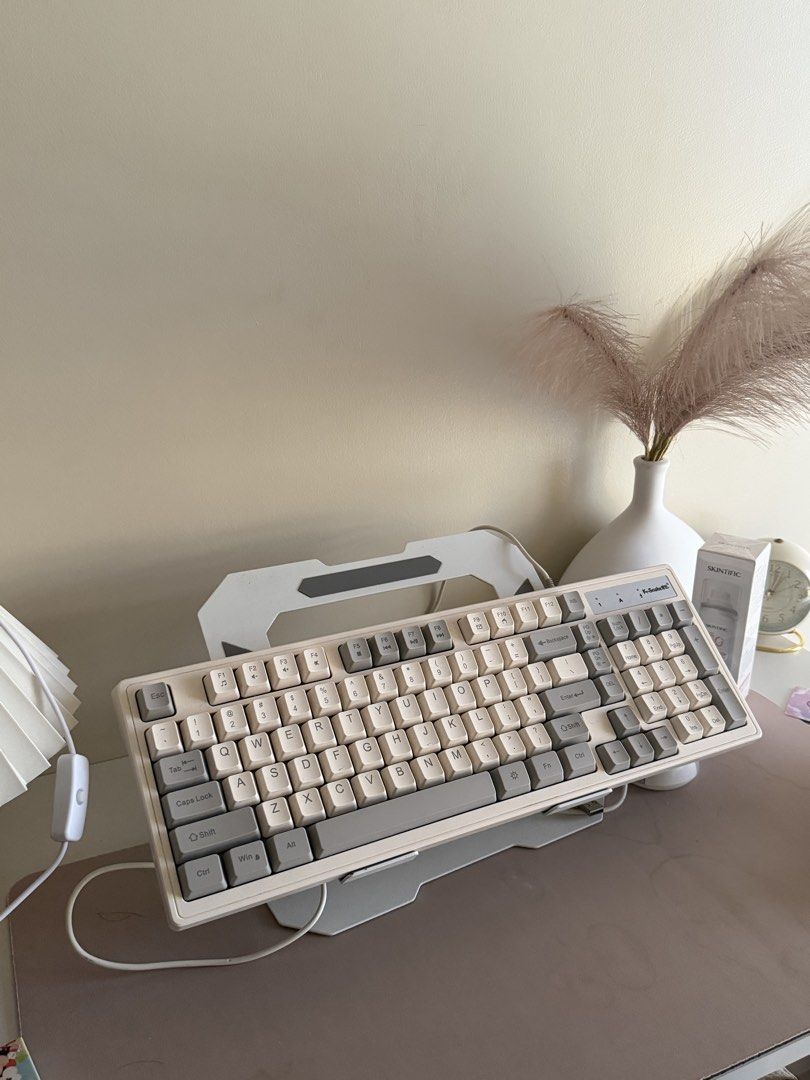 Keyboard + Laptop Stand (Category: Other Mobile & Gadget Accessories) located in Makati City. Submitted by unbotheredsky (Listing ID 1470836641, Image 1). Description: Barely used Aluminum Sturdy Laptop Stand Lightning Mechanical Keyboard .