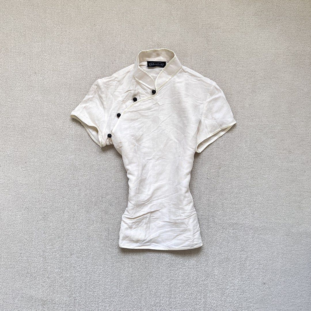 khenki oat qi pao top (Category: Blouses) located in Limay. Submitted by budolfindsrawrawr (Listing ID 1470784295, Image 1). Description: khenki oat qi pao top - fits medium l25 b34-36 - fabric feels like linen (no washtags) - in excellent condition .