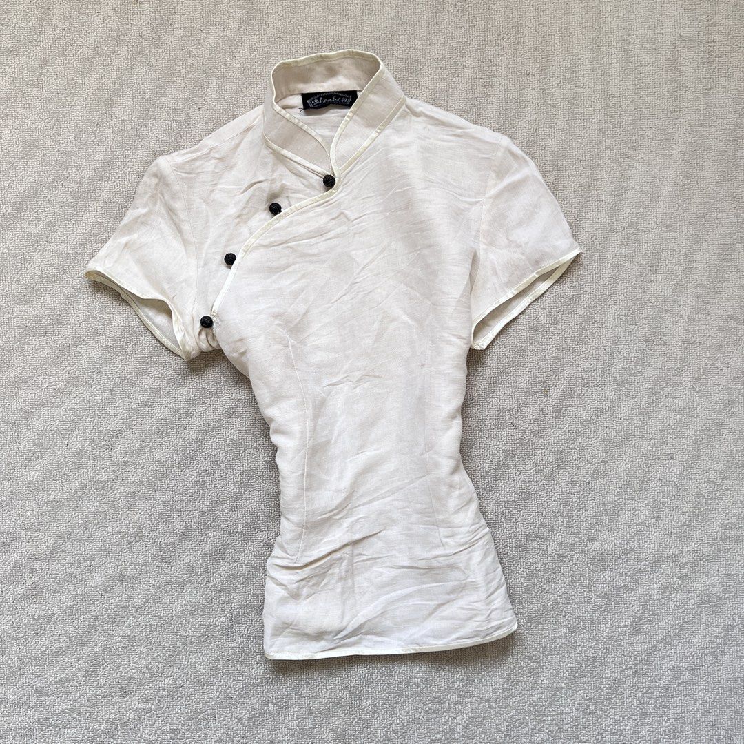 khenki oat qi pao top (Category: Blouses) located in Limay. Submitted by budolfindsrawrawr (Listing ID 1470784295, Image 2). Description: khenki oat qi pao top - fits medium l25 b34-36 - fabric feels like linen (no washtags) - in excellent condition .