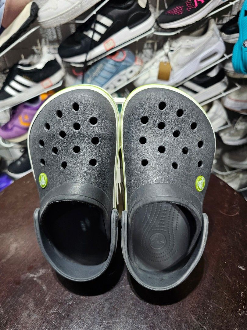 Kids Grey Crocs Crocband Clogs (FREE SHIPPING) (Category: Babies & Kids Fashion) located in Baguio. Submitted by kayeonlineshop (Listing ID 1470787907, Image 1). Description: (FREE SHIPPING!!!) Description: Selling an authentic, pre-owned pair of kids Crocs Crocband Clogs in Charcoal Grey. Features a sporty white and lime green stripe design along the sides. Super comfortable, lightweight, and perfect for active kids. Easy to wash down after play