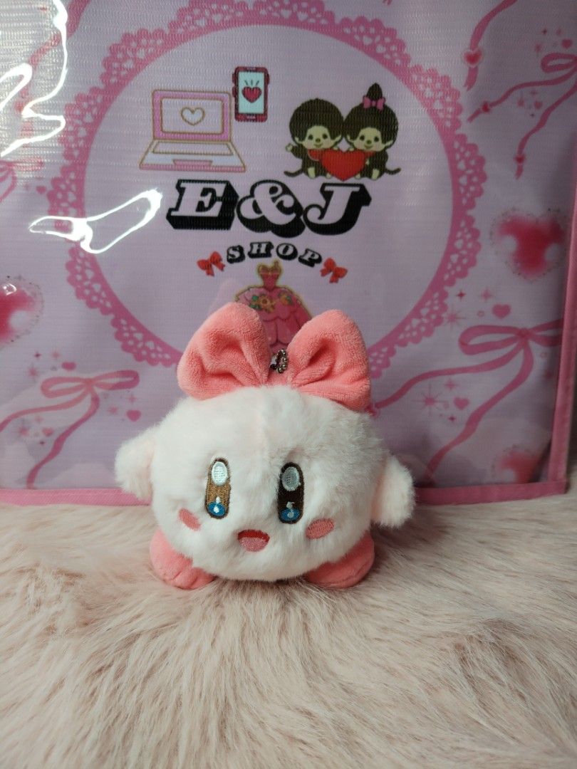 Kirby plush (Category: Plushies & Soft Toys) located in Paombong. Submitted by eandj.shop (Listing ID 1470887007, Image 2). Description: 🎀 Adorable white Kirby plush with a sweet pink bow 🎀 Ultra-soft, round material with embroidered face details .