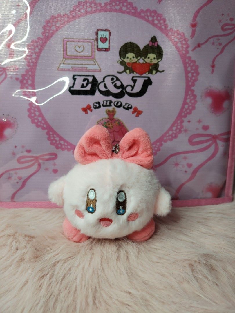Kirby plush (Category: Plushies & Soft Toys) located in Paombong. Submitted by eandj.shop (Listing ID 1470887007, Image 1). Description: 🎀 Adorable white Kirby plush with a sweet pink bow 🎀 Ultra-soft, round material with embroidered face details .