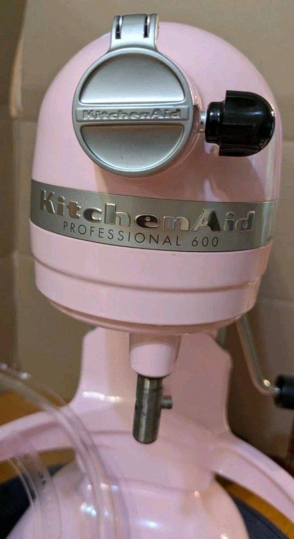 KitchenAid Pink Stand Mixer with Attachments (Category: Hand & Stand Mixers) located in Tagkawayan. Submitted by arieljose212086 (Listing ID 1470880489, Image 3). Description: - Model: KitchenAid Professional 600 Stand Mixer - Color: Stunning Pink - Condition: Powers up and runs strong, clean stainless steel bowl with minor mixing marks at the bottom - Included Attachments: Stainless steel bowl, flat beater, wire whip, and dough hook - Extras: Po