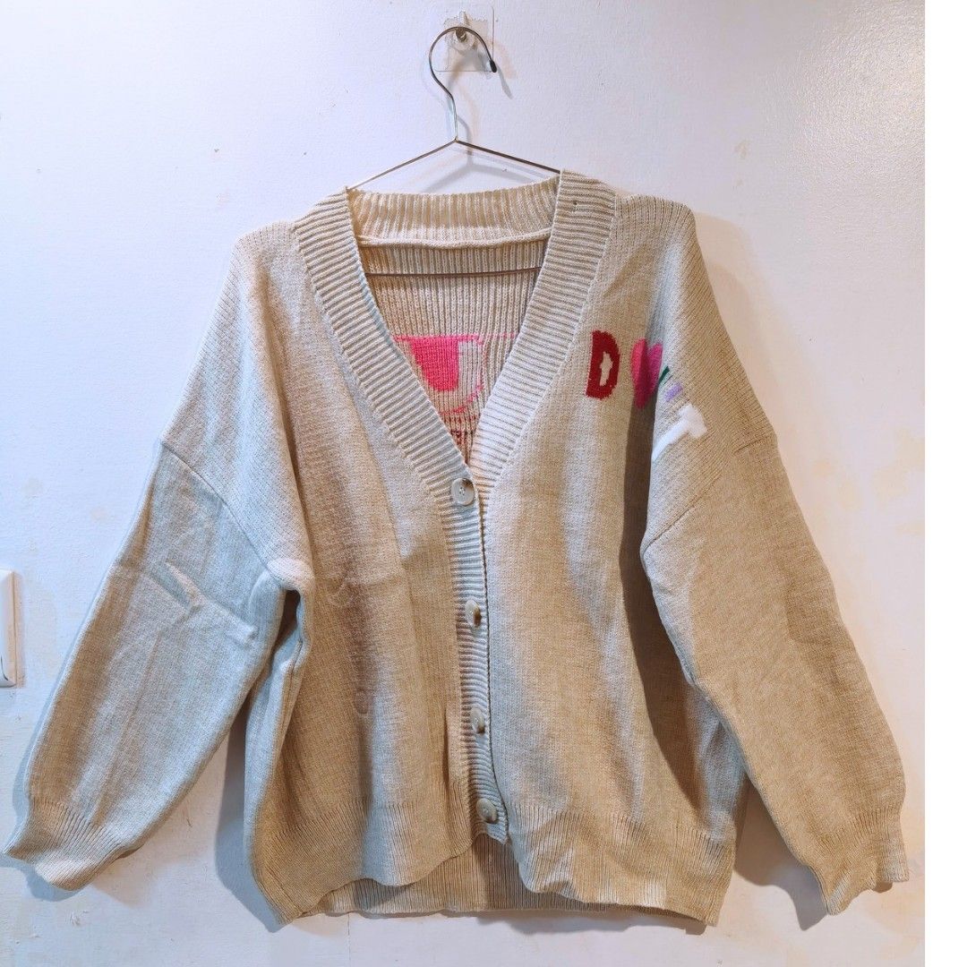 Knitted Sweater Cardigan (Category: Coats, Jackets and Outerwear) located in Quezon City. Submitted by trendyretro (Listing ID 1470826168, Image 3). Description: Brand new with pouch up to 2xl - 3xl Flaw: small hole as shown in the photo Soft thick knitted fabric.
