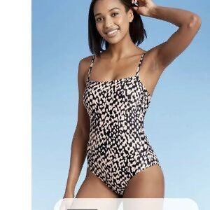 Kona sol one piece (Category: Bikinis & Swimsuits) located in Malabon City. Submitted by lheithriftshop (Listing ID 1470831635, Image 1). Description: shows a Kona Sol Square Neck One-Piece Swimsuit in a black-and-cream .