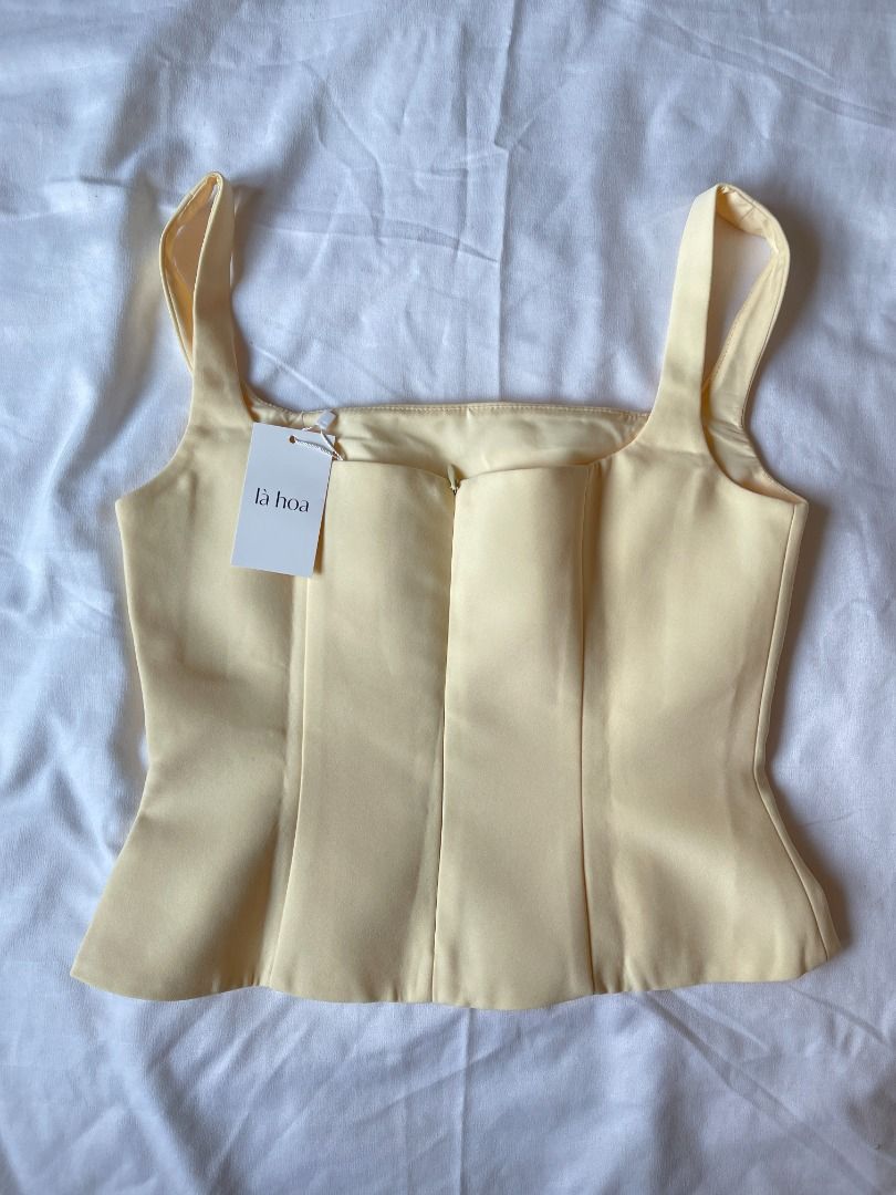 La Hoa Halter Top (Category: Sleeveless) located in Quezon City. Submitted by everythingmustgo__ (Listing ID 1470774970, Image 2). Description: La Hoa Halter Top (from Vietnam 🇻🇳) - brand new with tags - size: medium (bust 32-33" / waist 26-27") (when worn not mine) - super nice quality!! iykyk ‼️ firm with price. low ballers will not be entertained ‼️.