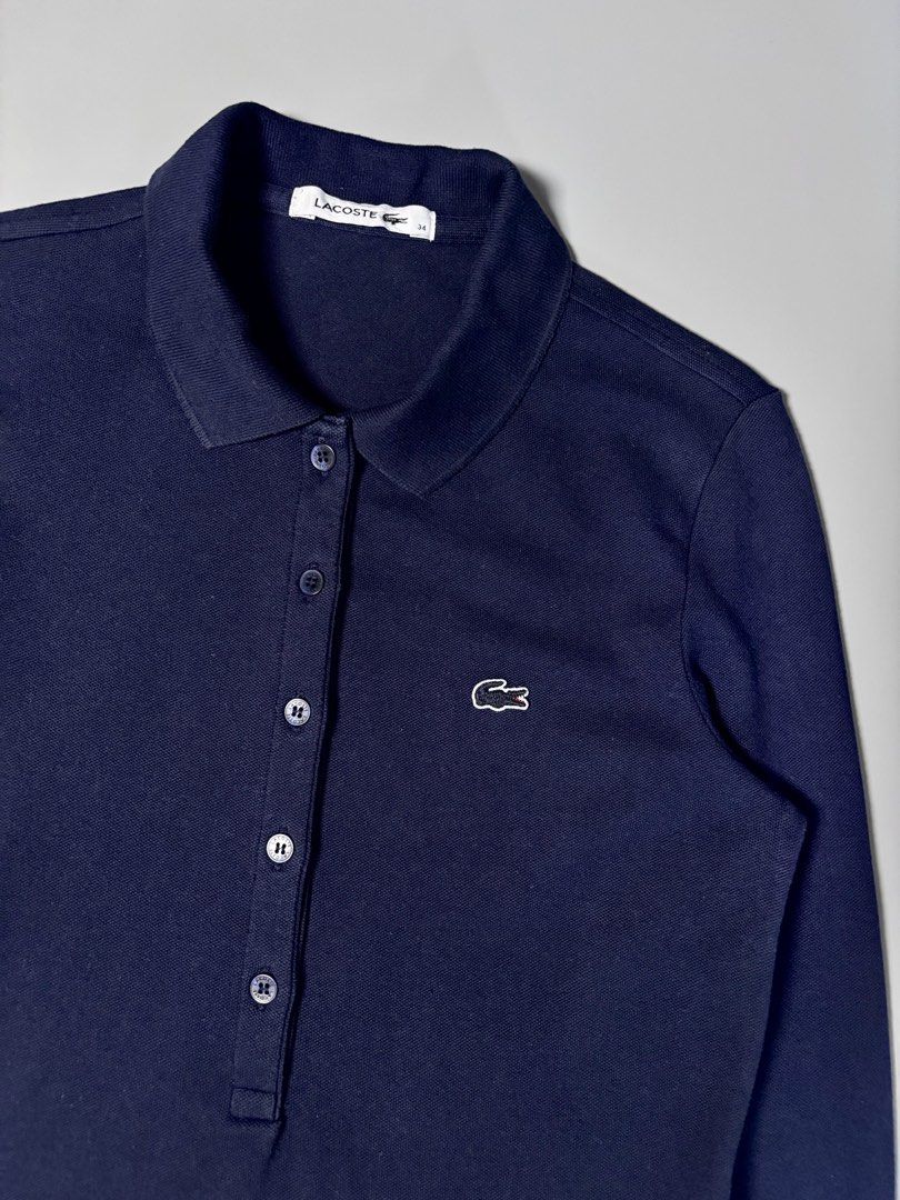 Lacoste 5 Buttons Long Sleeve (Category: Longsleeves) located in Pulilan. Submitted by dmappareal (Listing ID 1470890715, Image 2). Description: Lacoste 5 Buttons Long Sleeve 16 x 23.5 34 on tag 9.7 Color rate Excellent - Like new condition Issue : Stain ( not noticeable when worn ) ₱ 1,750.