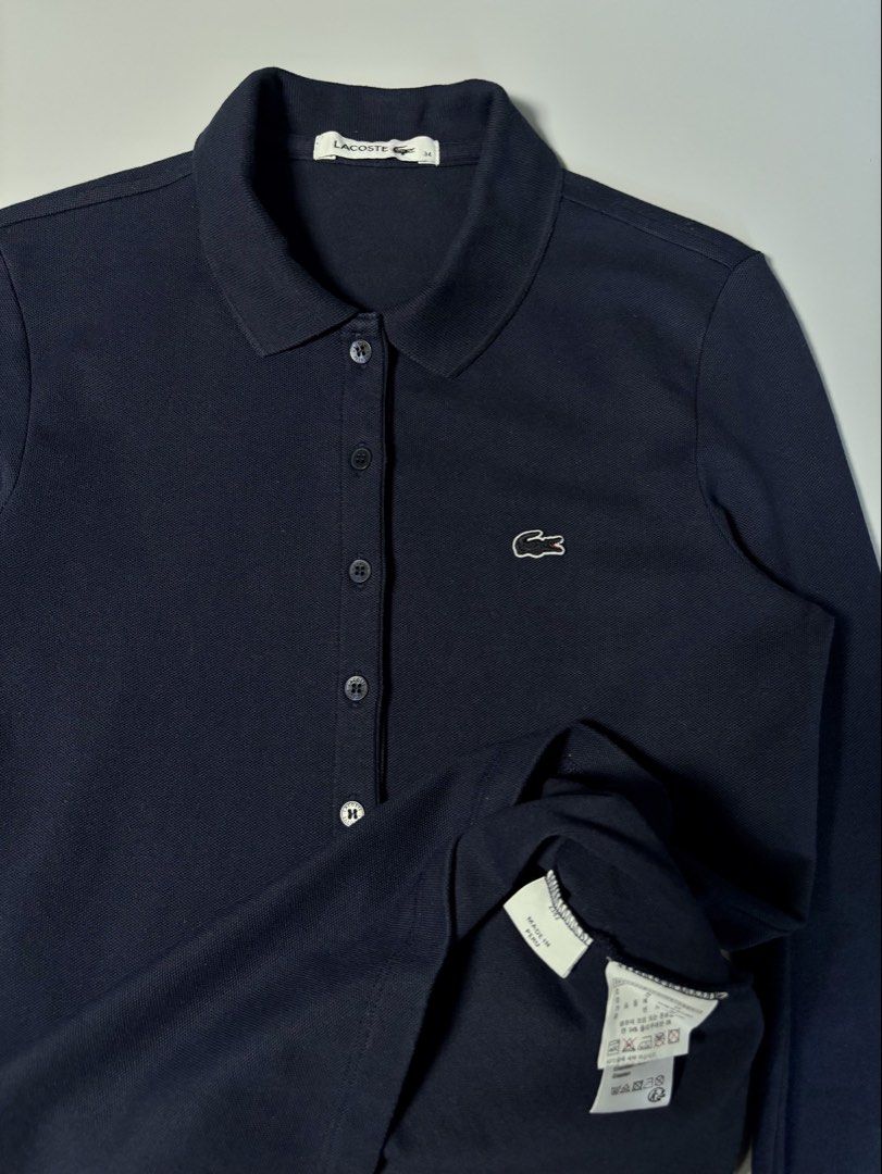 Lacoste 5 Buttons Long Sleeve (Category: Longsleeves) located in Pulilan. Submitted by dmappareal (Listing ID 1470890715, Image 3). Description: Lacoste 5 Buttons Long Sleeve 16 x 23.5 34 on tag 9.7 Color rate Excellent - Like new condition Issue : Stain ( not noticeable when worn ) ₱ 1,750.