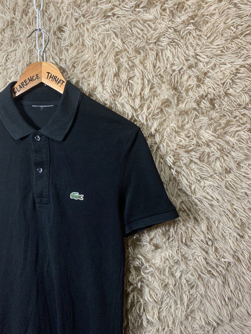 Lacoste Black Polo Shirt Size 2 (Category: Tshirts & Polo Shirts ) located in Cotabato. Submitted by clarence0918 (Listing ID 1470857493, Image 2). Description: Lacòsté Size small to med 18x27 Excellent condition 9.5/10 Color rate *sign of usage only sa collar(no collar line) Need wash only .