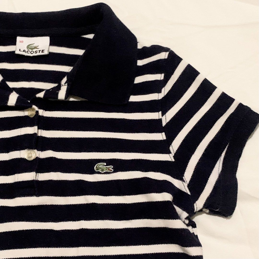 lacoste midnight blue/white stripes collared polo shirt (Category: Shirts) located in Bacolod City. Submitted by attheratesign (Listing ID 1470840207, Image 2). Description: • 38/med women’s • ran small, best fits xs-s • l: 22” • w: 14” • 94% cotton, 6% elasthanne • good condition, authentic — no when worn — washed — these are thrifted items, manage expectations — there may be flaws that were missed, x if sensi — first to pay gets the item — no r