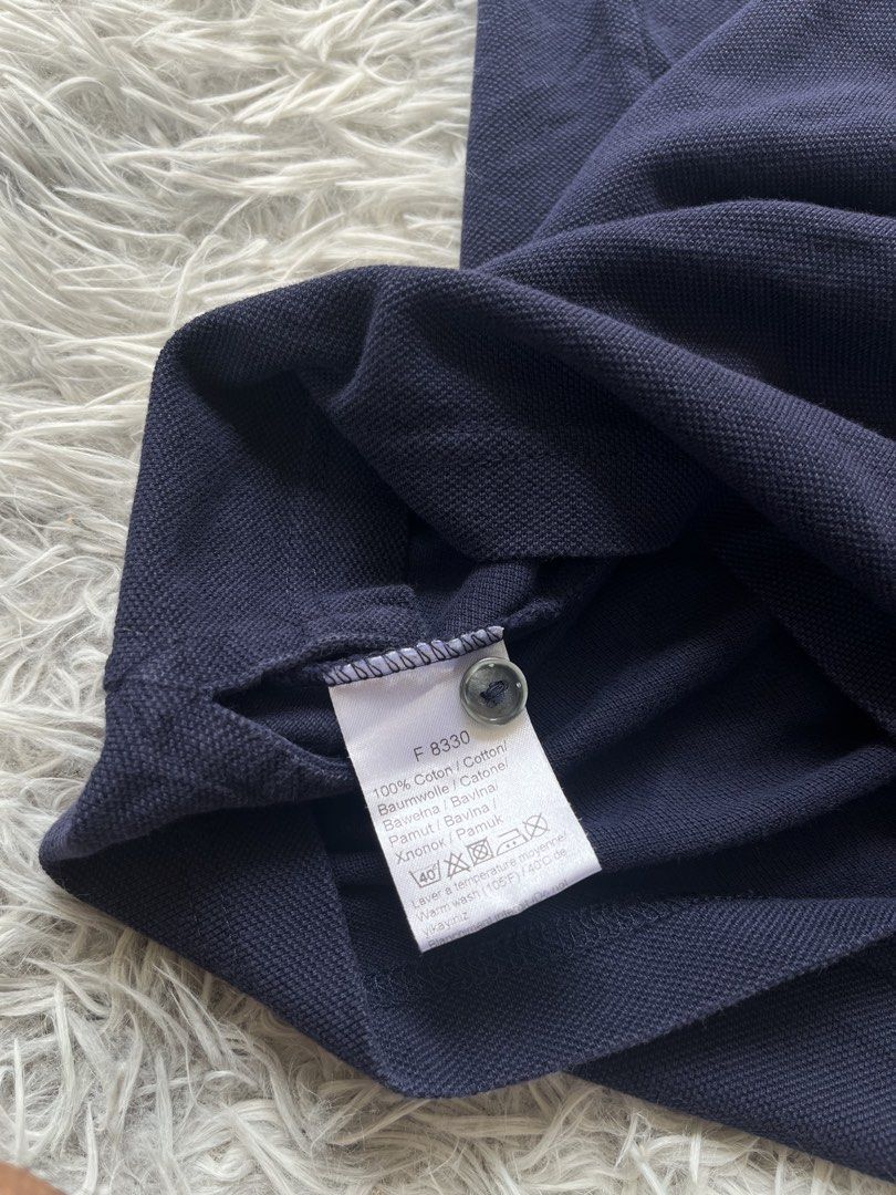 Lacoste Navy Blue Polo Shirt (Category: Tshirts & Polo Shirts ) located in Lipa City. Submitted by kent.finds (Listing ID 1470880313, Image 3). Description: Dimension: 📏W 18 📏L 26 Color Rate: 9.5/10 📌Excellent Condition 💸 Mine : ₱1,200 + Shipping Fee🚚 Issue: ❌.