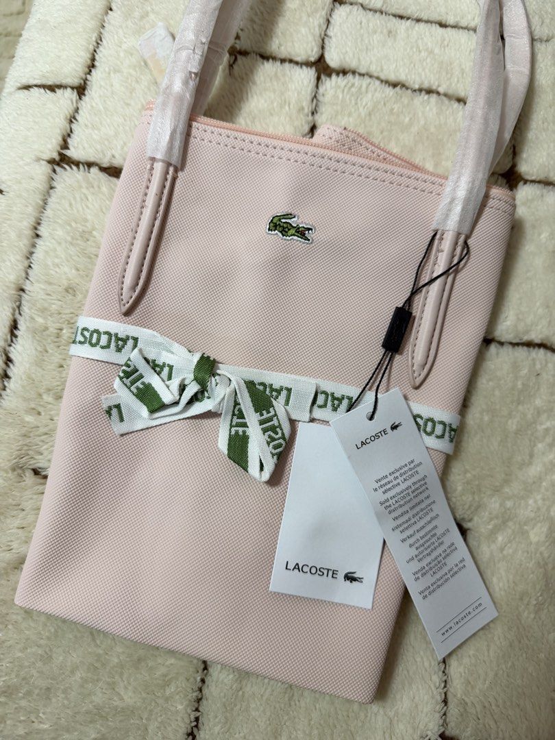 Lacoste Pink Tote Bag (Category: Tote Bags) located in Manila. Submitted by bln.preloved (Listing ID 1470915157, Image 3). Description: - recently bought. Was told na authentic but I don’t think it is that’s why I’m selling it. - no more pics and as is sa posted pics makukuha .