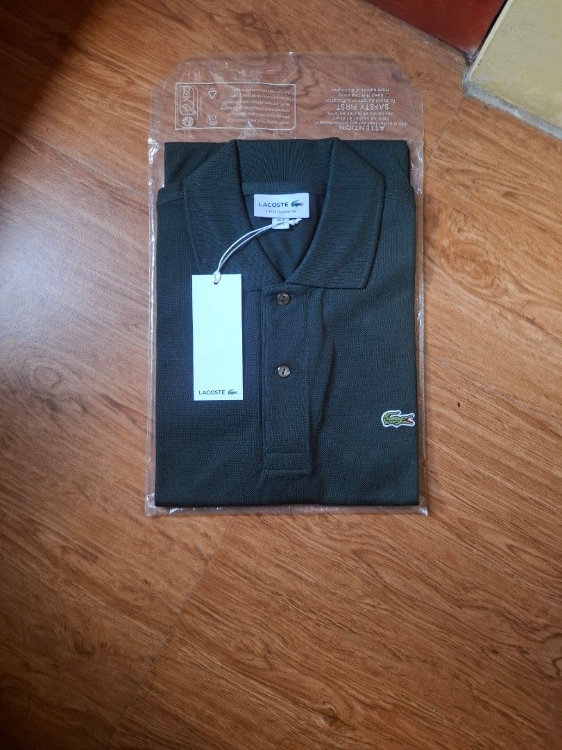 Lacoste Polo Shirt Green (Category: Tshirts & Polo Shirts ) located in Manila. Submitted by dylanhits0413 (Listing ID 1470891638, Image 1). Description: Classic fit L.12.12 Dark Green Color with original receipt and bag .