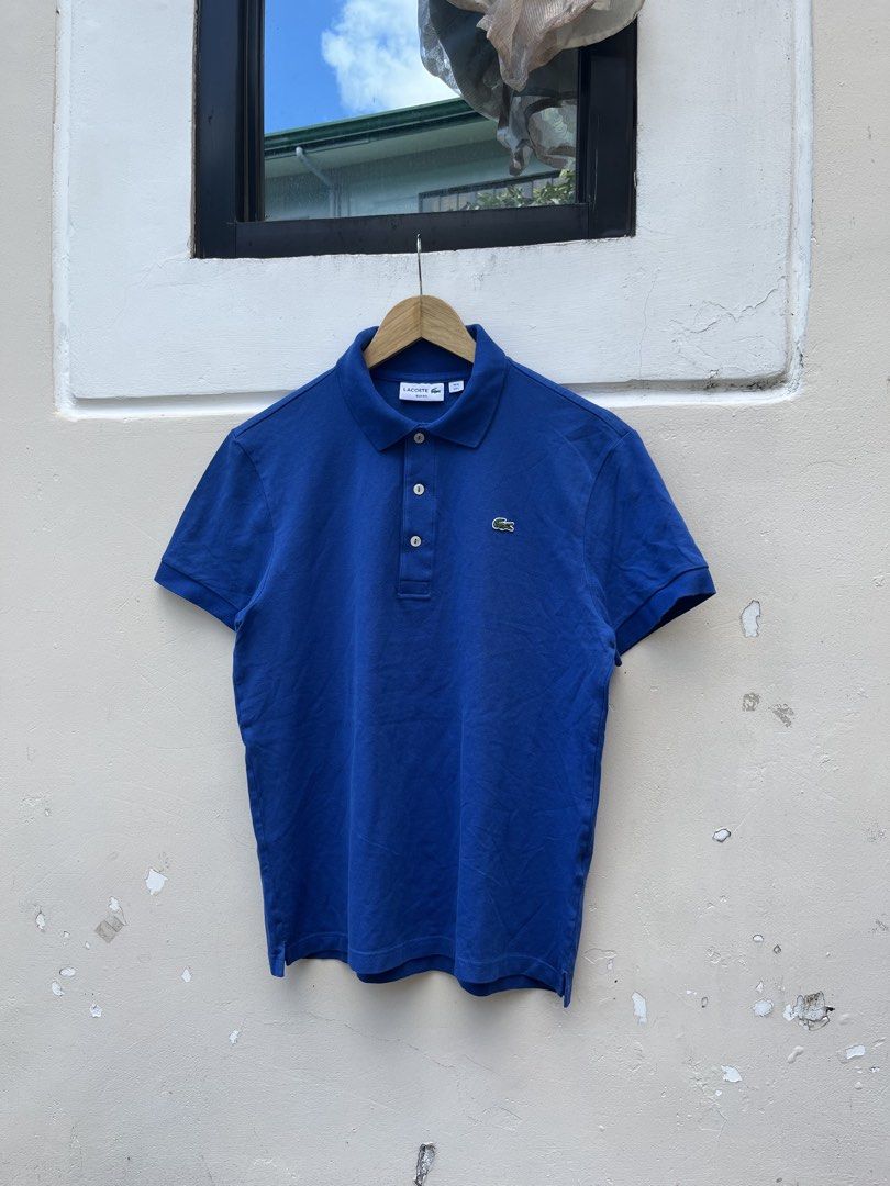 LACOSTE POLO SHIRT SLIM FIT (Category: Tshirts & Polo Shirts ) located in Baguio. Submitted by closetgc.clothingshop (Listing ID 1470777779, Image 2). Description: LACOSTE POLO SHIRT SLIM FIT BEST FIT MEDIUM - LARGE GUARANTEED AUTHENTIC IN EXCELLENT CONDITION.