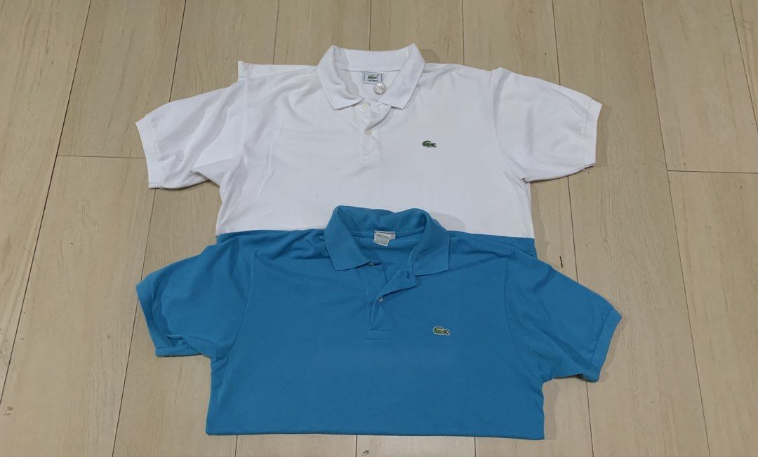 Lacoste Polo Shirts 450 for both (Category: Tshirts & Polo Shirts ) located in Manila. Submitted by thrifty111 (Listing ID 1470845957, Image 1). Description: - Set of 2 classic Lacoste polo shirts: White and Bright Blue - Material: Soft, breathable, and comfortable cotton - Design: Short sleeves, standard collar, and 2-button placket - Branding: Iconic embroidered green crocodile logo on the chest - Versatile: Great for daily casual wear and smar