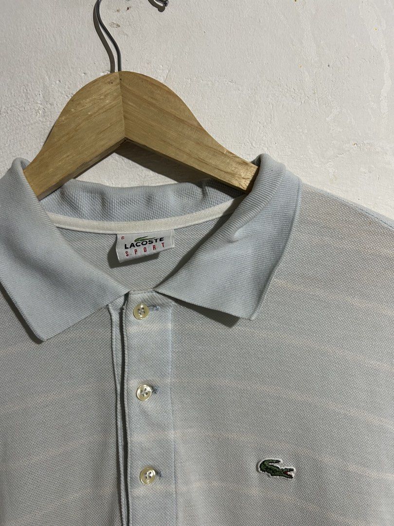 Lacoste Sport Polo Shirt Light Blue Size 6 Devanlay (Category: Tshirts & Polo Shirts ) located in Manila. Submitted by romnick907 (Listing ID 1470820161, Image 2). Description: - Brand: Lacoste Sport (Devanlay) - Size: Tagged Size 6 (Standard Fit) - Color: Light Blue with horizontal stripes and contrast chest stripe - Material: Breathable cotton knit with ribbed collar and cuffs - Details: Classic 3-button placket, signature embroidered crocodile