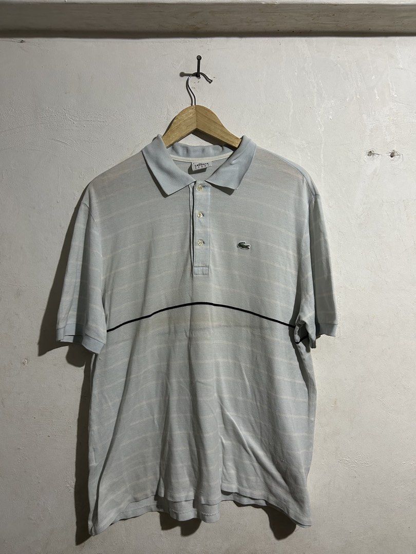 Lacoste Sport Polo Shirt Light Blue Size 6 Devanlay (Category: Tshirts & Polo Shirts ) located in Manila. Submitted by romnick907 (Listing ID 1470820161, Image 1). Description: - Brand: Lacoste Sport (Devanlay) - Size: Tagged Size 6 (Standard Fit) - Color: Light Blue with horizontal stripes and contrast chest stripe - Material: Breathable cotton knit with ribbed collar and cuffs - Details: Classic 3-button placket, signature embroidered crocodile