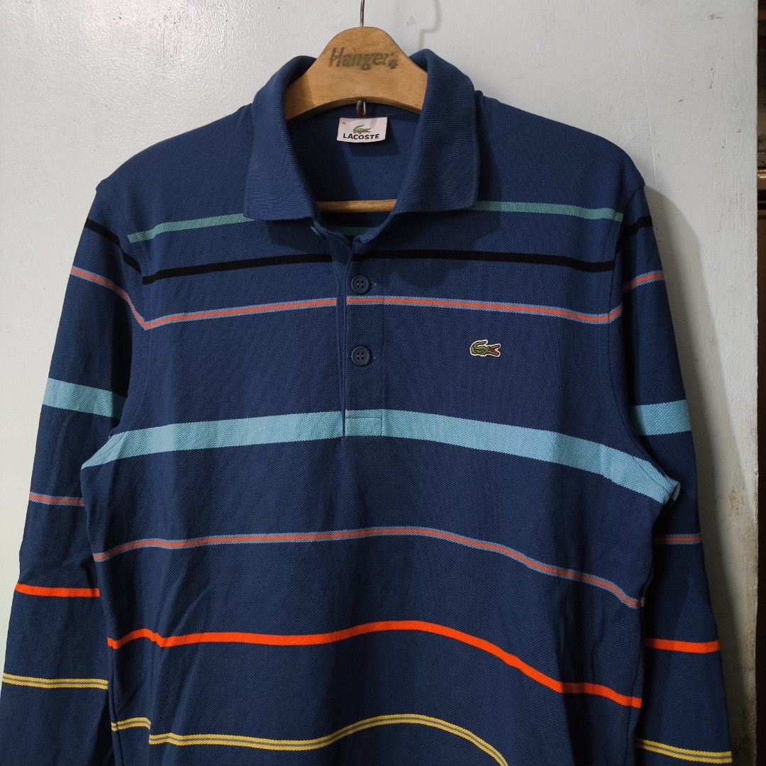 Lacoste Stripe Blue Sweater Polo Long Sleeve (Category: Formal Shirts) located in Quezon City. Submitted by jedclo (Listing ID 1470830872, Image 2). Description: Size M Width: 27 Length: 27. In pristine condition Color due lightning MOP: GCASH, DM to purchase Disclaimer: "All brand names, logos, and images are registered trademarks of their respective owners. No affiliation or copyright infringement intended.