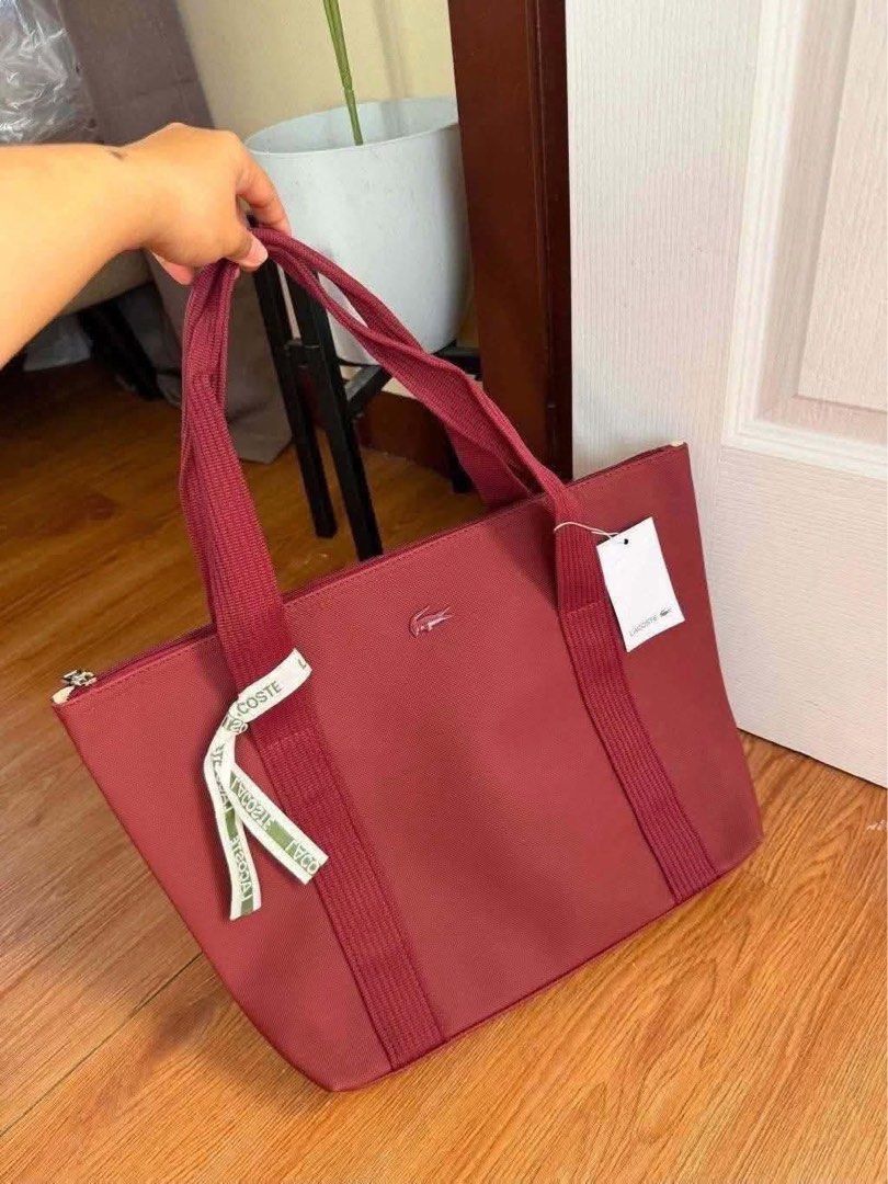 Lacoste Tote Bag (Category: Tote Bags) located in Quezon City. Submitted by stuffs.hellyy (Listing ID 1470913281, Image 2). Description: 📌Lacoste medium tote 📌15” inches size (fit up to 13-15 inches laptop) 📌 thick material .