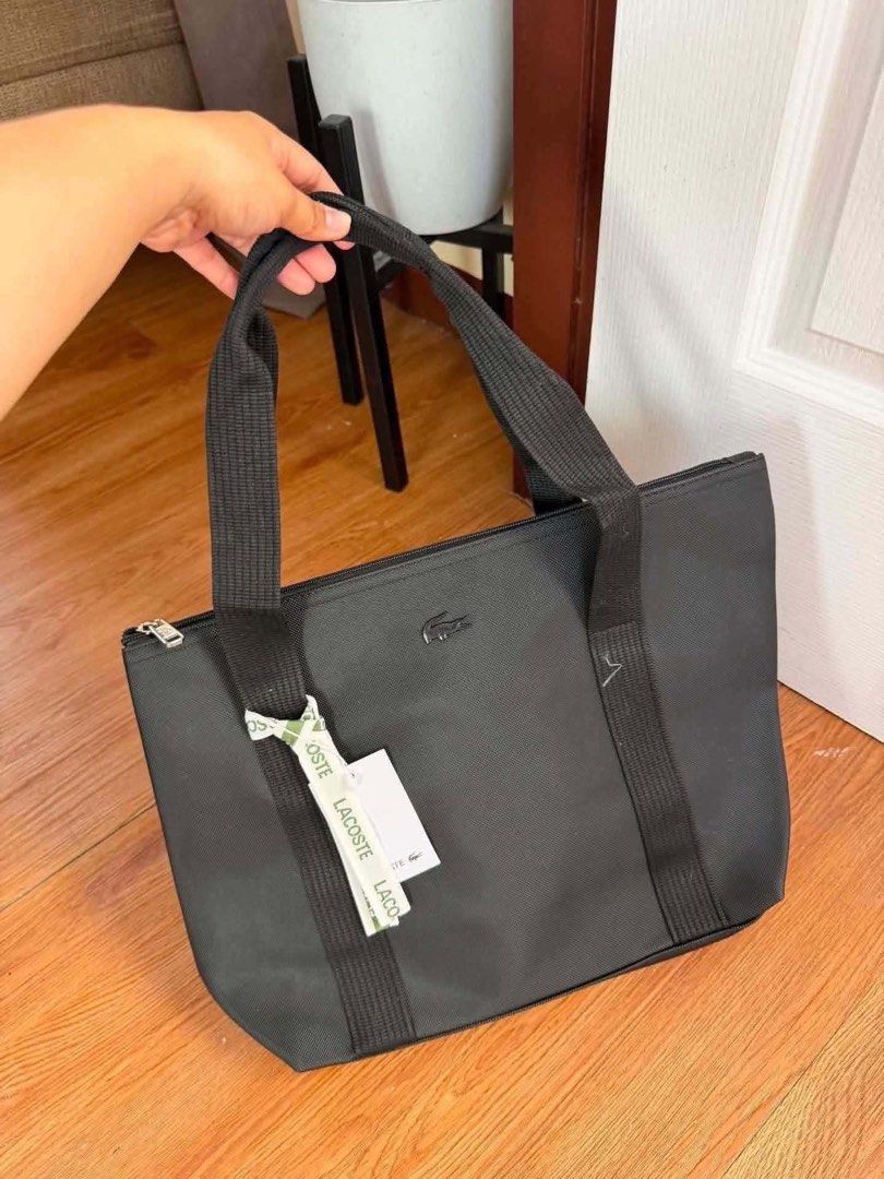Lacoste Tote Bag (Category: Tote Bags) located in Quezon City. Submitted by stuffs.hellyy (Listing ID 1470913281, Image 3). Description: 📌Lacoste medium tote 📌15” inches size (fit up to 13-15 inches laptop) 📌 thick material .