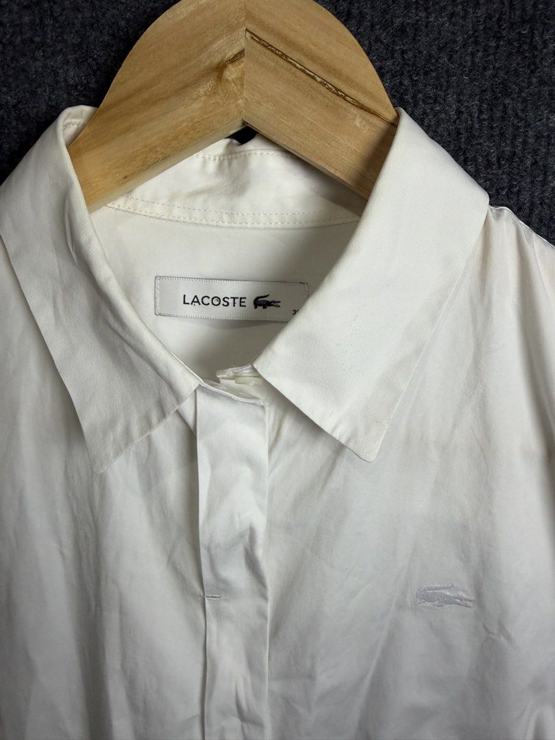 Lacoste White Long Sleeve Button Down Shirt (Category: Longsleeves) located in Baguio. Submitted by thriftcoded_2600 (Listing ID 1470863329, Image 1). Description: - Lacoste Button Down Polo - Excellent Condition - Size: 36(M-L fit) - 20x25.5 -Authentic .
