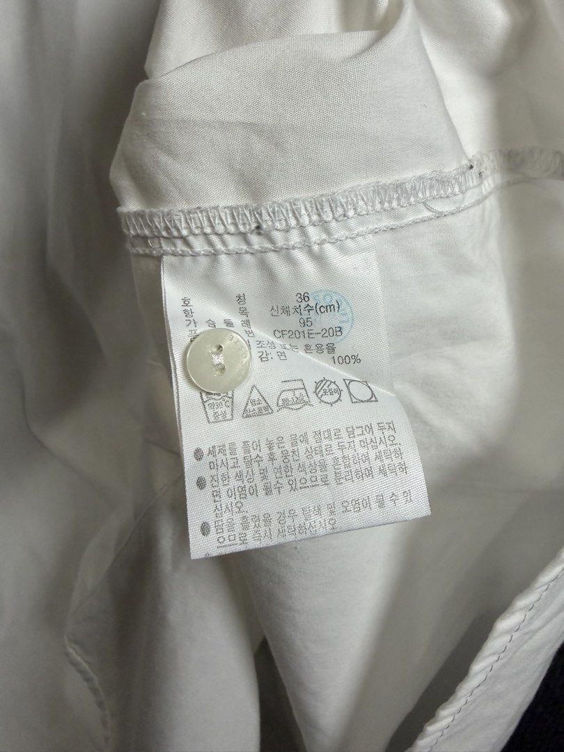 Lacoste White Long Sleeve Button Down Shirt (Category: Longsleeves) located in Baguio. Submitted by thriftcoded_2600 (Listing ID 1470863329, Image 3). Description: - Lacoste Button Down Polo - Excellent Condition - Size: 36(M-L fit) - 20x25.5 -Authentic .