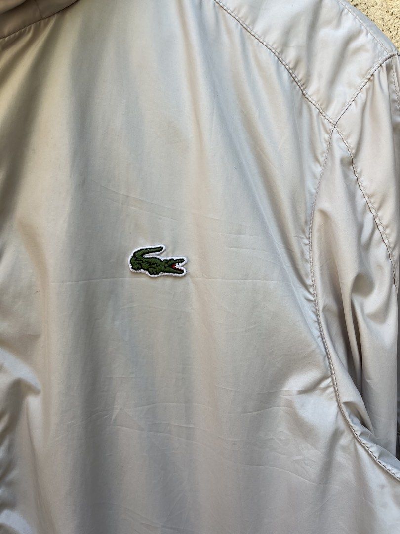 Lacoste Windbreaker Packable Hood (Category: Coats, Jackets and Outerwear) located in Angeles City. Submitted by brkebys (Listing ID 1470841882, Image 3). Description: Good condition Issue check last 2 pictures No pinholes, No scratches Good ribbings & garter.