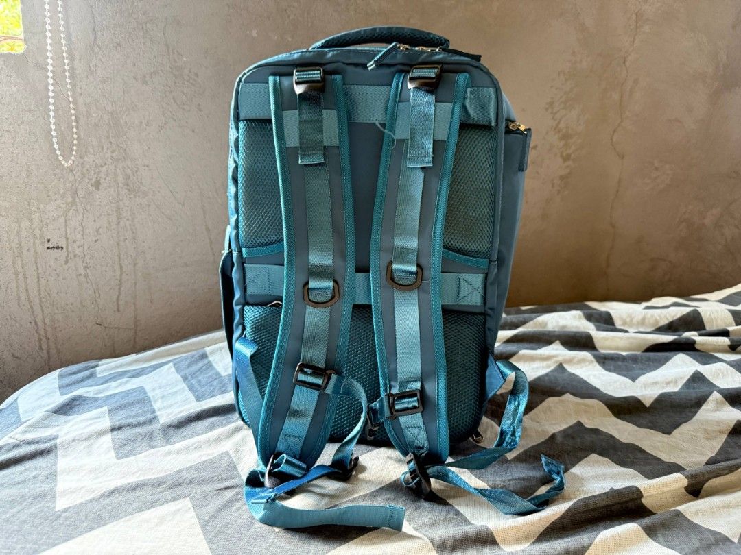 Large Travel Backpack with Shoe Compartmeny, Water Proof (Category: Backpacks) located in Quezon City. Submitted by heylil.space (Listing ID 1470835301, Image 3). Description: Features: Spacious main compartment with light gray lining. Multiple zippered compartments and front pockets. Padded, breathable mesh back panel. Adjustable padded shoulder straps. Top carry handle. Side pockets for additional storage External USB port with internal USB cab