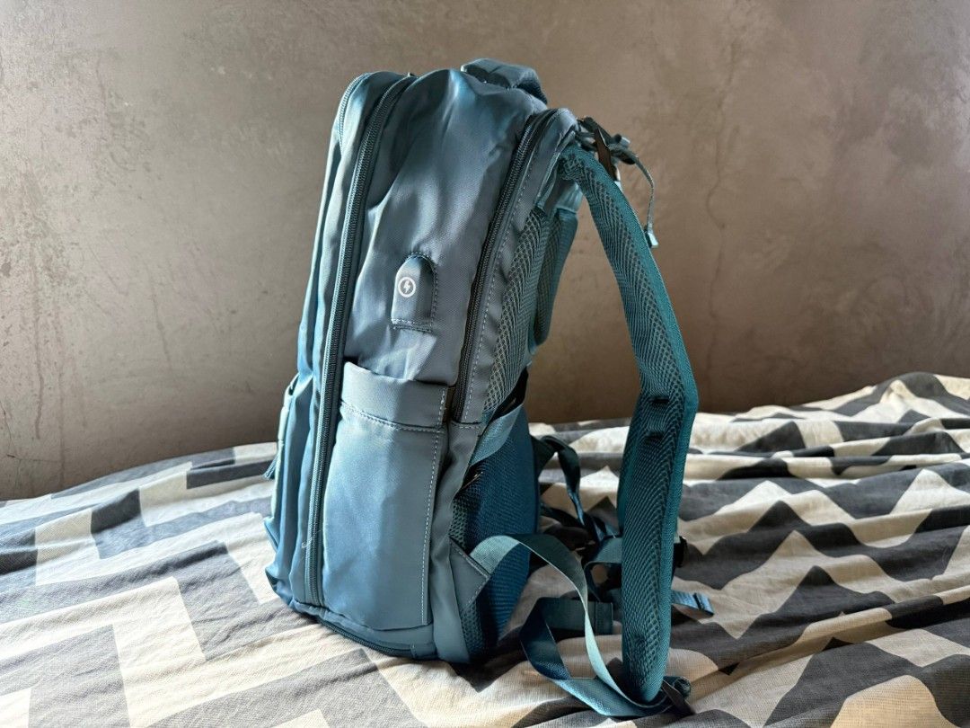 Large Travel Backpack with Shoe Compartmeny, Water Proof (Category: Backpacks) located in Quezon City. Submitted by heylil.space (Listing ID 1470835301, Image 2). Description: Features: Spacious main compartment with light gray lining. Multiple zippered compartments and front pockets. Padded, breathable mesh back panel. Adjustable padded shoulder straps. Top carry handle. Side pockets for additional storage External USB port with internal USB cab