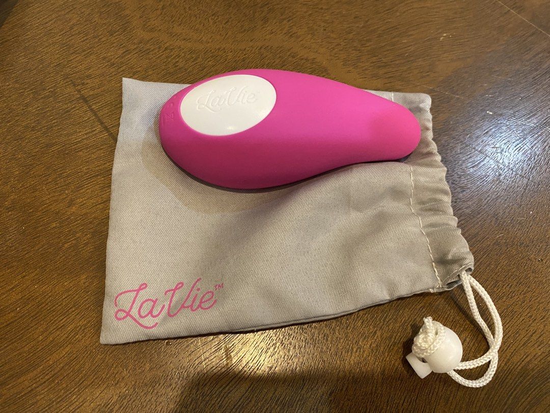 LaVie Lactation Massager (Category: Breastfeeding & Bottle Feeding) located in Santa Rosa. Submitted by hoardqueensdeclutter (Listing ID 1470871490, Image 2). Description: - Authentic LaVie lactation massager in pink with a white accent button - Helps relieve clogged ducts and improve milk flow during nursing or pumping - Comes with original grey drawstring storage pouch with the LaVie logo - Sanitized, clean, and ready for immediate use - Ships 