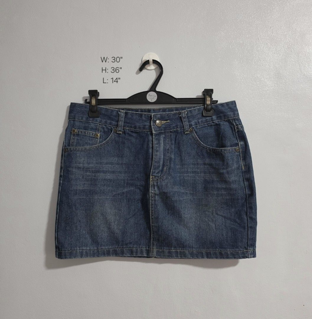 Lee Riders Denim Skirt (Category: Skirts) located in Paranaque City. Submitted by franinnashop (Listing ID 1470796806, Image 1). Description: Declutter - Brand: Lee Riders - Style: Classic blue denim skirt - Size: Waist 30", Hips 36", Length 14" - Closure: Front button with zipper fly - Pockets: Traditional 5-pocket styling plus coin pocket - Details: Contrast yellow stitching, branded metal hardware, and dark leather back patch - Material: Durab