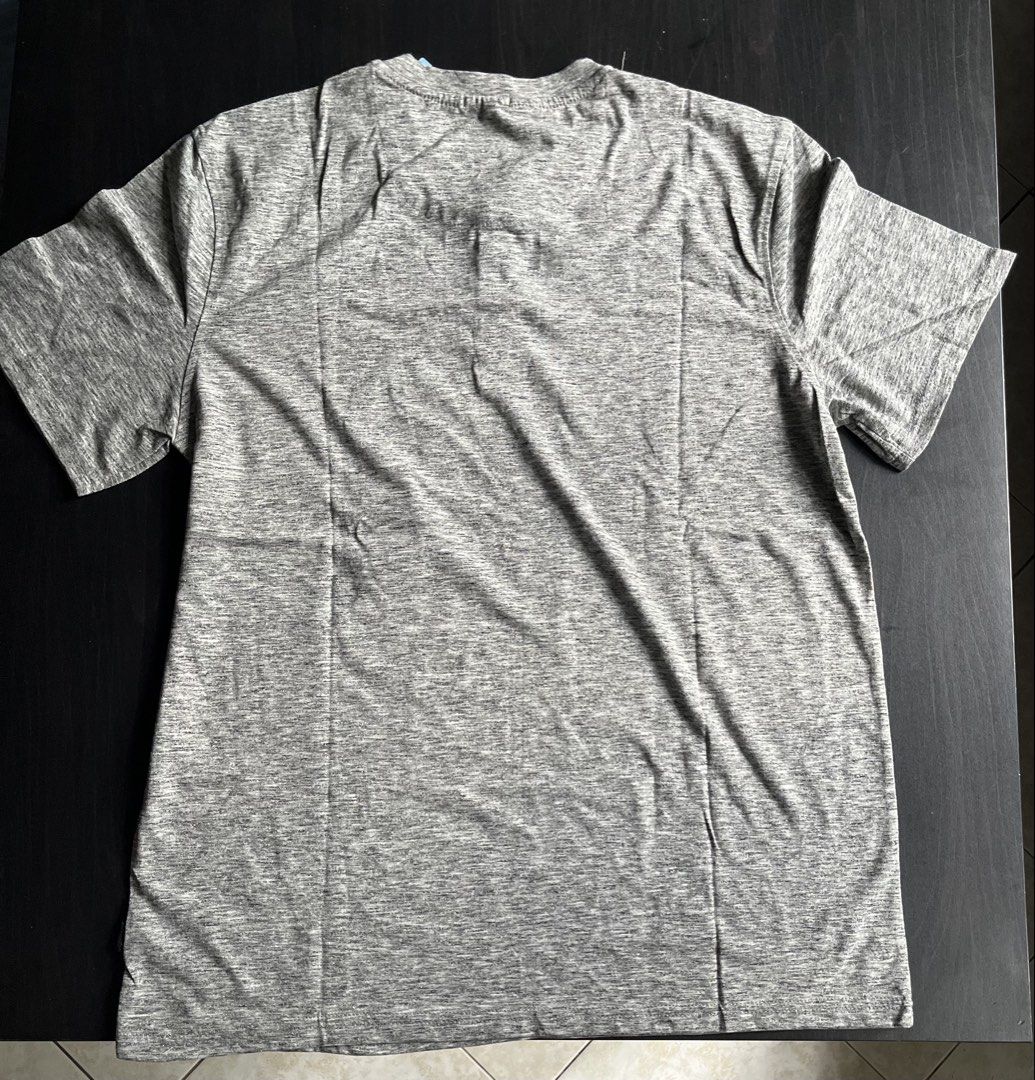 Lee SS Henley Grey T-Shirt Size L (Category: Tshirts & Polo Shirts ) located in Manila. Submitted by sunshineapril (Listing ID 1470808849, Image 2). Description: - Brand: Lee - Style: Short sleeve henley shirt - Size: Large - Color: Grey heathered knit - Material: 60% cotton, 40% polyester blend - Details: Classic three-button placket, straight hemline, standard fit - Condition: Brand new with original retail tag attached ($42).