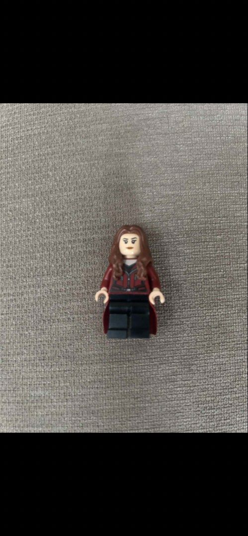 LEGO Marvel Avengers Scarlet Witch Minifigure (Category: Lego & Building Sets) located in Makati City. Submitted by rcg98 (Listing ID 1470809387, Image 1). Description: - Authentic LEGO Marvel Scarlet Witch minifigure - Features dark red hair, printed torso with jacket, cloth skirt, and black legs - Sourced from a clean, smoke-free home - Perfect addition to any Marvel collection - Ready for shipping or meetup.