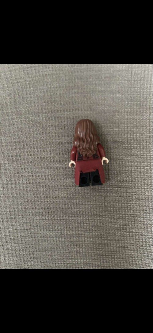 LEGO Marvel Avengers Scarlet Witch Minifigure (Category: Lego & Building Sets) located in Makati City. Submitted by rcg98 (Listing ID 1470809387, Image 2). Description: - Authentic LEGO Marvel Scarlet Witch minifigure - Features dark red hair, printed torso with jacket, cloth skirt, and black legs - Sourced from a clean, smoke-free home - Perfect addition to any Marvel collection - Ready for shipping or meetup.