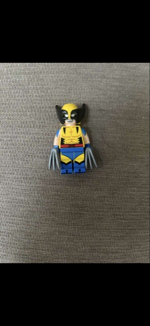 LEGO Marvel X-Men Wolverine Minifigure with Claws (Category: Lego & Building Sets) located in Makati City. Submitted by rcg98 (Listing ID 1470809824, Image 2). Description: - Character: LEGO Wolverine from the X-Men series - Design: Classic yellow and blue suit with front and back torso printing - Includes: Cowl and signature claw accessories - Condition: Brand new / Excellent addition to any Marvel collection - Shipping: Fast shipping available 