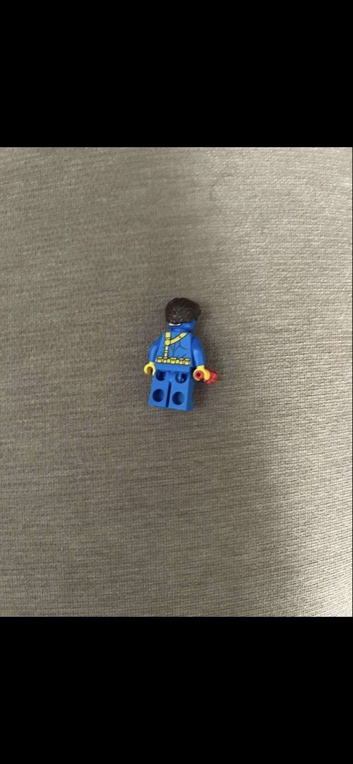 LEGO X-Men Cyclops Minifigure with Red Visor Effect (Category: Lego & Building Sets) located in Makati City. Submitted by rcg98 (Listing ID 1470762252, Image 2). Description: - 100% Authentic LEGO X-Men Cyclops minifigure - Classic blue and yellow X-Men uniform with detailed belt and strap printing - Includes dark brown hair piece and red optic blast effect piece - Yellow hands and complete set as pictured - Perfect addition for Marvel superhero 