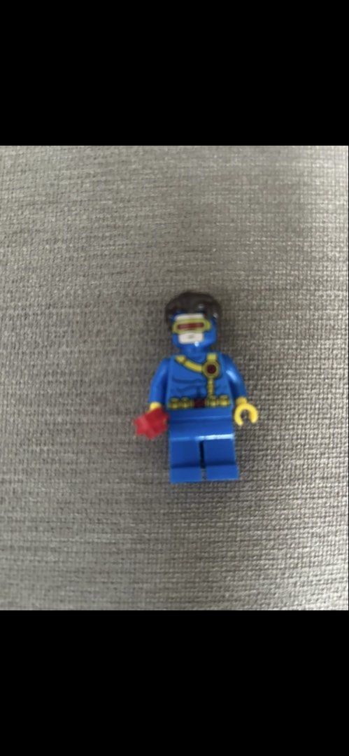 LEGO X-Men Cyclops Minifigure with Red Visor Effect (Category: Lego & Building Sets) located in Makati City. Submitted by rcg98 (Listing ID 1470762252, Image 1). Description: - 100% Authentic LEGO X-Men Cyclops minifigure - Classic blue and yellow X-Men uniform with detailed belt and strap printing - Includes dark brown hair piece and red optic blast effect piece - Yellow hands and complete set as pictured - Perfect addition for Marvel superhero 