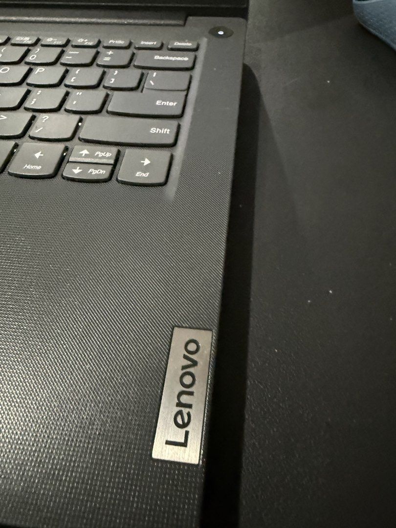 Lenovo IdeaPad Slim 3 Laptop (Category: Laptops & Notebooks) located in Muntinlupa City. Submitted by felipeferreira (Listing ID 1470920443, Image 3). Description: - Model: Lenovo IdeaPad Slim 3 - Color: Sleek black with textured chassis finish - Display & OS: Clean screen running Windows 10/11 - Audio & Video: Dolby Audio speakers and built-in webcam privacy shutter - Keyboard: Standard QWERTY layout with dedicated number row keys and responsive