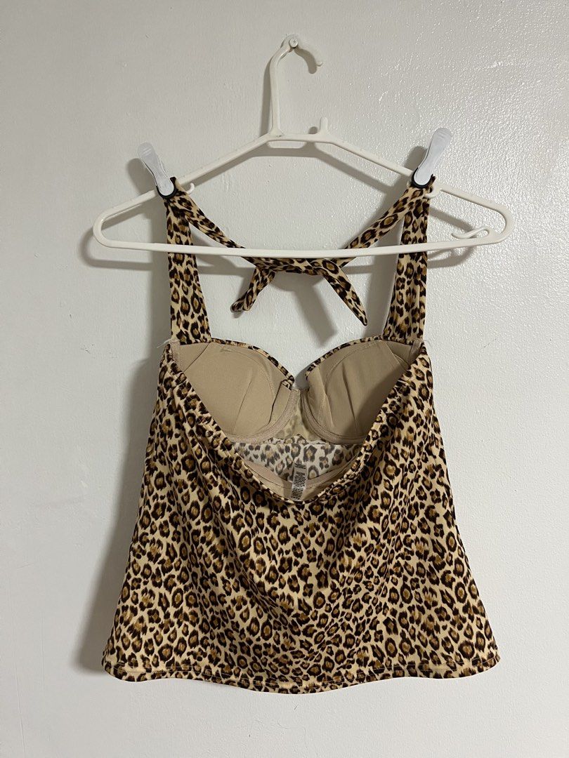 Leopard Print Halter Tankini Top (Category: Sleeveless) located in Cabuyao City. Submitted by rdtrmt (Listing ID 1470817543, Image 3). Description: - Trendy beige and brown wild leopard print - Supportive molded underwire cups - Adjustable halter neck tie closure - Flattering flared body style - Condition: still in good condition.