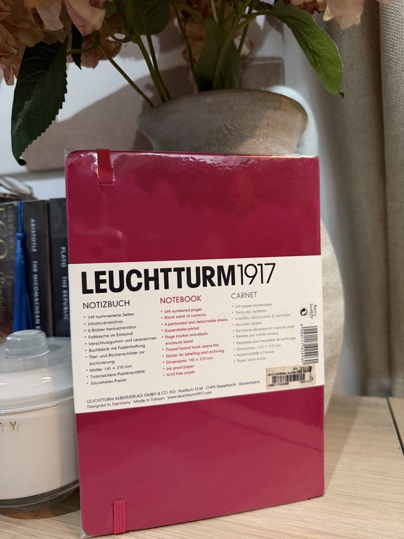 Leuchtturm1917 Medium Hardcover Notebook Dotted Berry (Category: Stationery & School Supplies) located in Manila. Submitted by anneec (Listing ID 1470825555, Image 2). Description: - Brand new - Color: Berry (Medium size: 145 x 210 mm) - 249 numbered pages with dotted layout - Features elastic closure band, ribbon bookmark, and expandable back pocket - High-quality acid-free and ink-proof paper.
