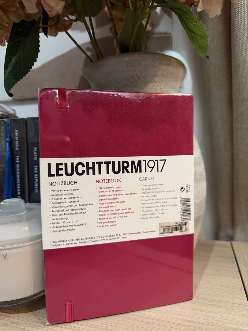 Leuchtturm1917 Medium Hardcover Notebook Dotted Berry (Category: Stationery & School Supplies) located in Manila. Submitted by anneec (Listing ID 1470825555, Image 3). Description: - Brand new - Color: Berry (Medium size: 145 x 210 mm) - 249 numbered pages with dotted layout - Features elastic closure band, ribbon bookmark, and expandable back pocket - High-quality acid-free and ink-proof paper.