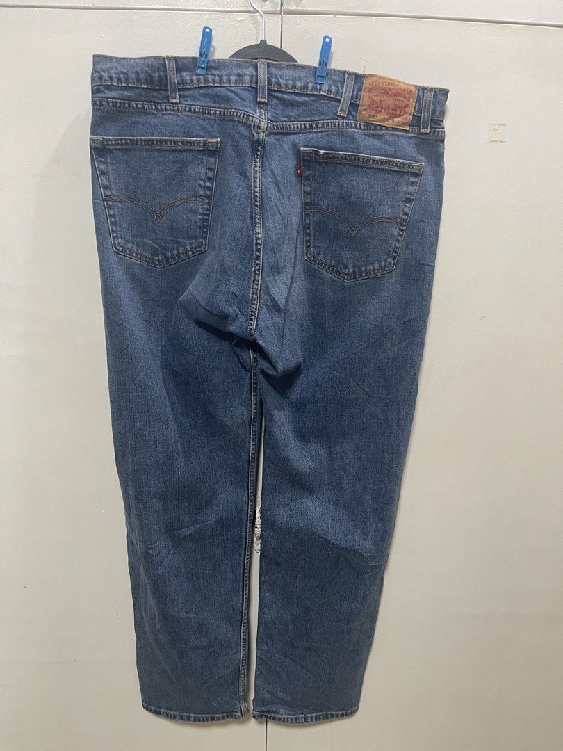 Levi's 505 Regular Fit Jeans W40 L32 (Category: Jeans) located in Davao. Submitted by rcgulanes.moon (Listing ID 1470881832, Image 3). Description: - Brand/Model: Classic Levi's 505 - Wash: Medium blue - Fit: Straight leg with zip fly and branded button closure - Details: Traditional 5-pocket styling with contrast stitching and leather back patch - Size: Tagged waist 40, length 32 - Condition: Sturdy denim fabric, ready to wear.