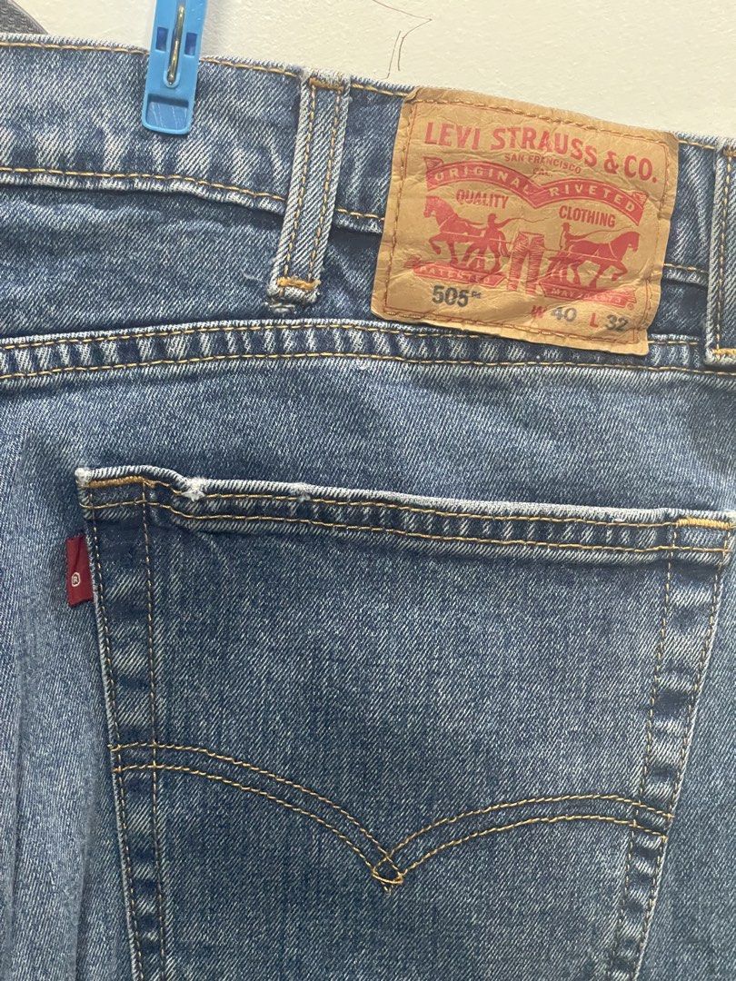 Levi's 505 Regular Fit Jeans W40 L32 (Category: Jeans) located in Davao. Submitted by rcgulanes.moon (Listing ID 1470881832, Image 2). Description: - Brand/Model: Classic Levi's 505 - Wash: Medium blue - Fit: Straight leg with zip fly and branded button closure - Details: Traditional 5-pocket styling with contrast stitching and leather back patch - Size: Tagged waist 40, length 32 - Condition: Sturdy denim fabric, ready to wear.