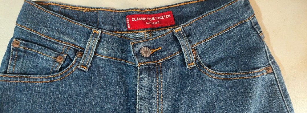 Levi's 512 Classic Slim Stretch Tapered Jeans (Category: Jeans) located in Baguio. Submitted by ayra1523 (Listing ID 1470772403, Image 1). Description: - Brand: Levi's - Style: 512 Classic Slim Stretch Tapered - Color: Blue Denim - Size: 6 M - Material: 74% Cotton, 15% Polyester, 11% Lycra - Features: Classic 5-pocket styling, zip fly with button closure, iconic red tab, and leather waistband patch - Origin: Made in Mexico - Condition: Excellent.